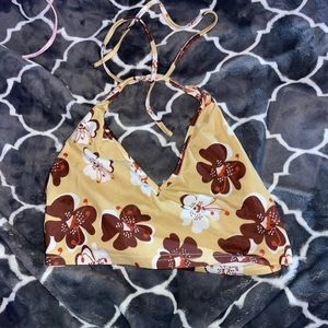 Very cute tan and flowered cropped tank top.